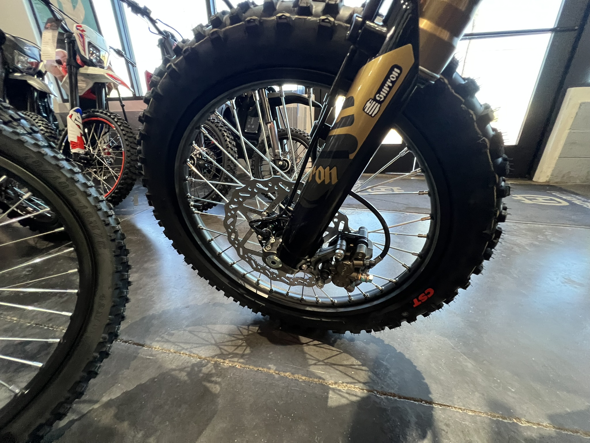 2025 surron ultra bee black front wheel adn tire