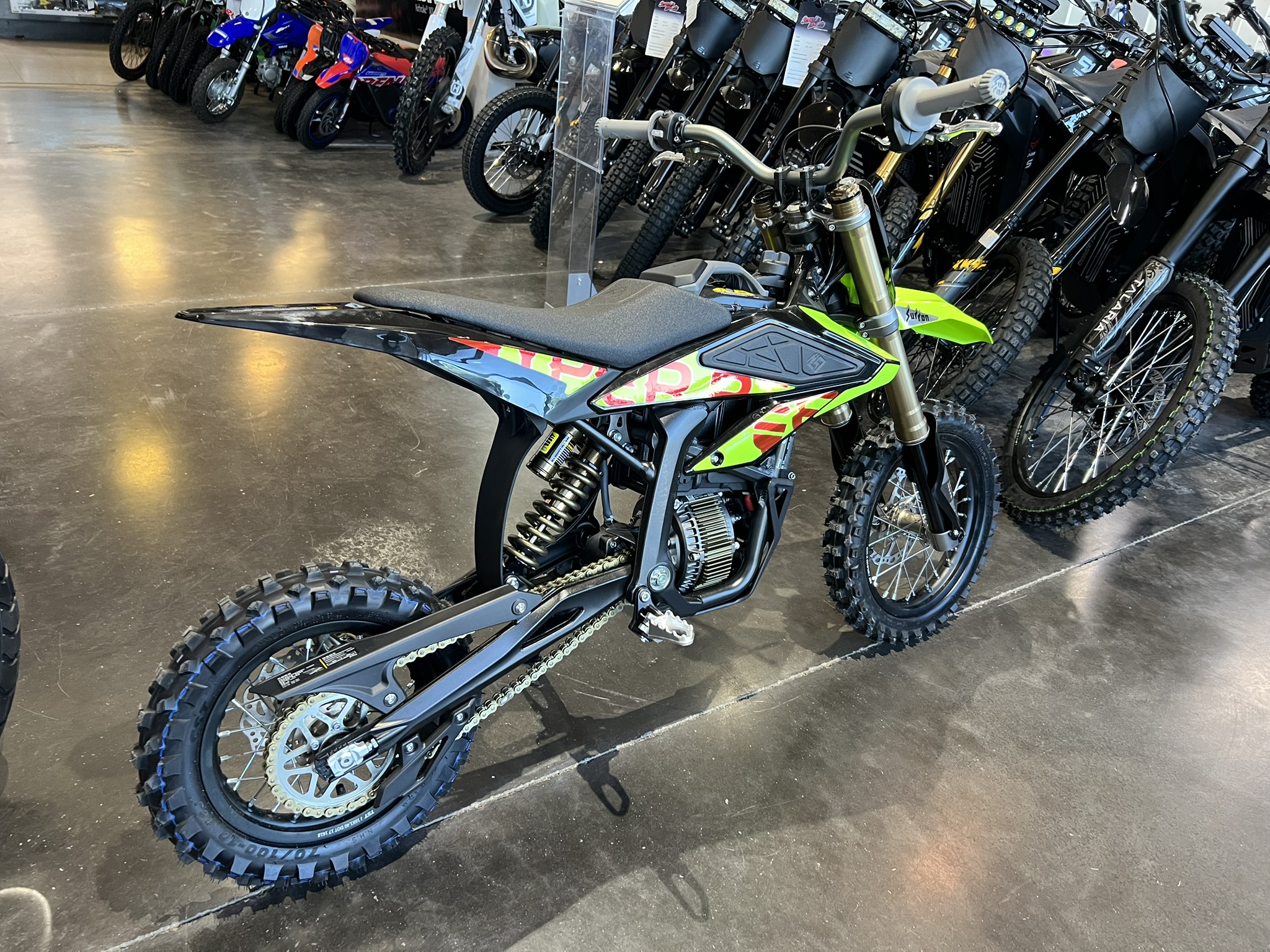 blue surron hyper bee green back end view