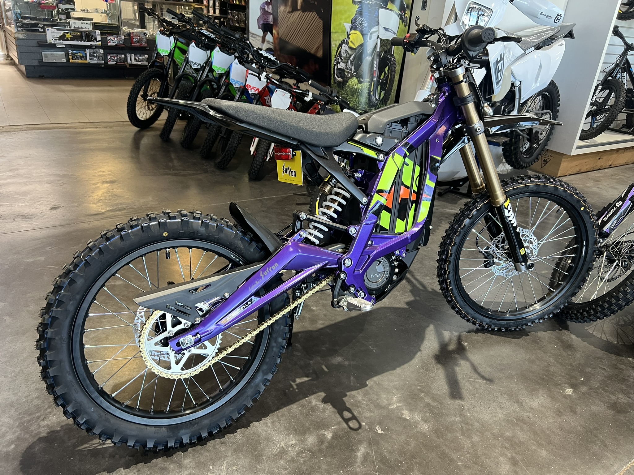 25 surron lbx purple back side profile