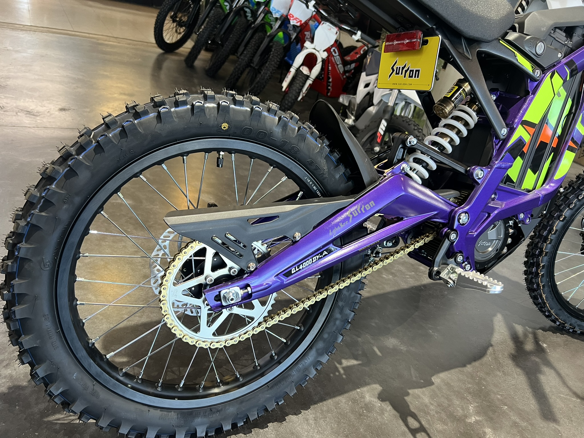 25 surron lbx purple rear wheel