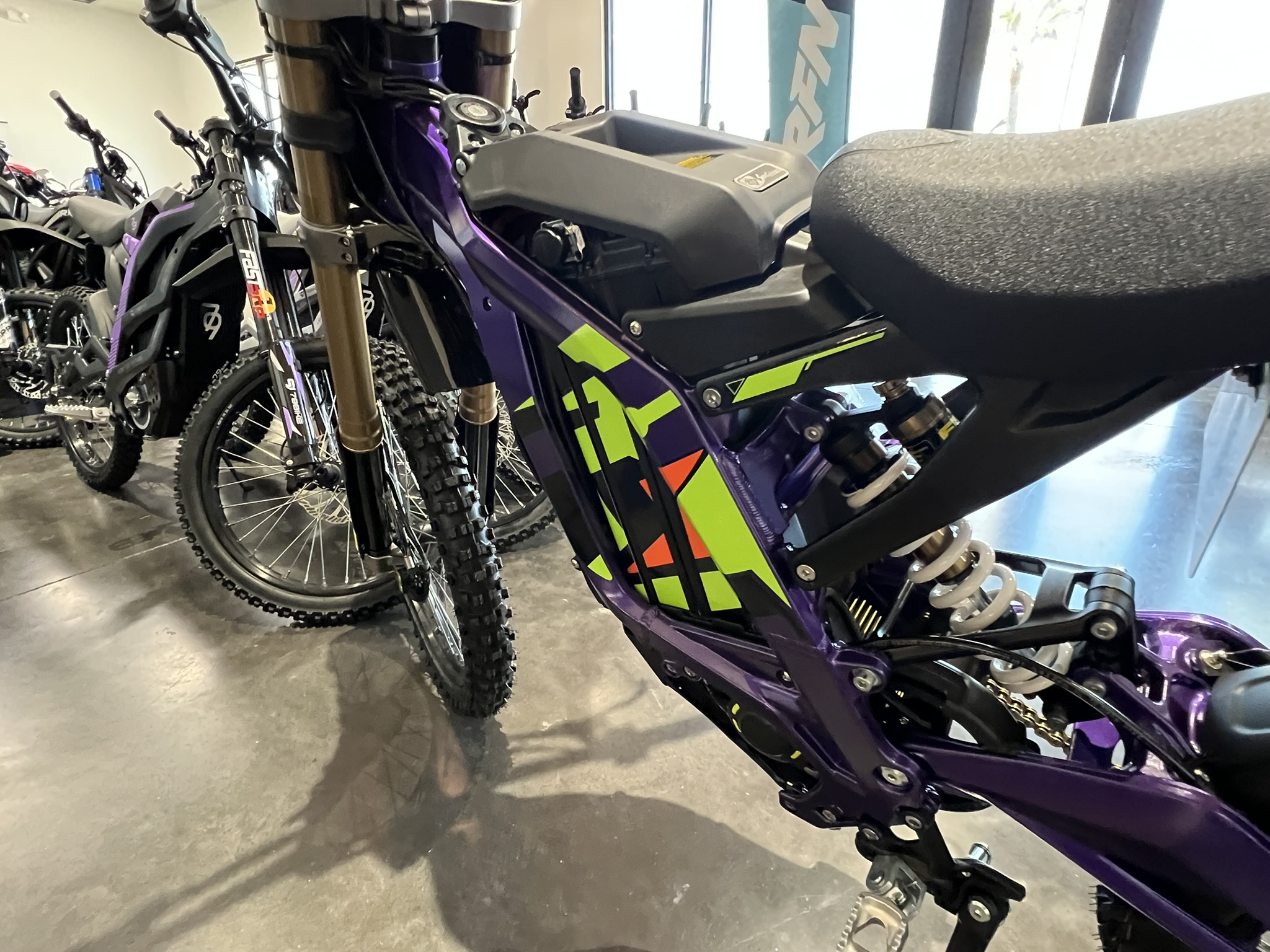 25 surron lbx purple left side graphics