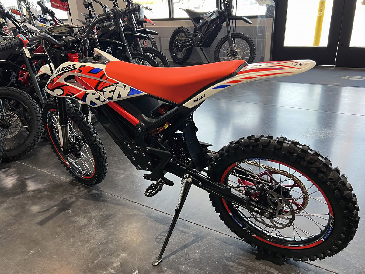 White and Red RFN E-dirt Bike - Left Side Angle View