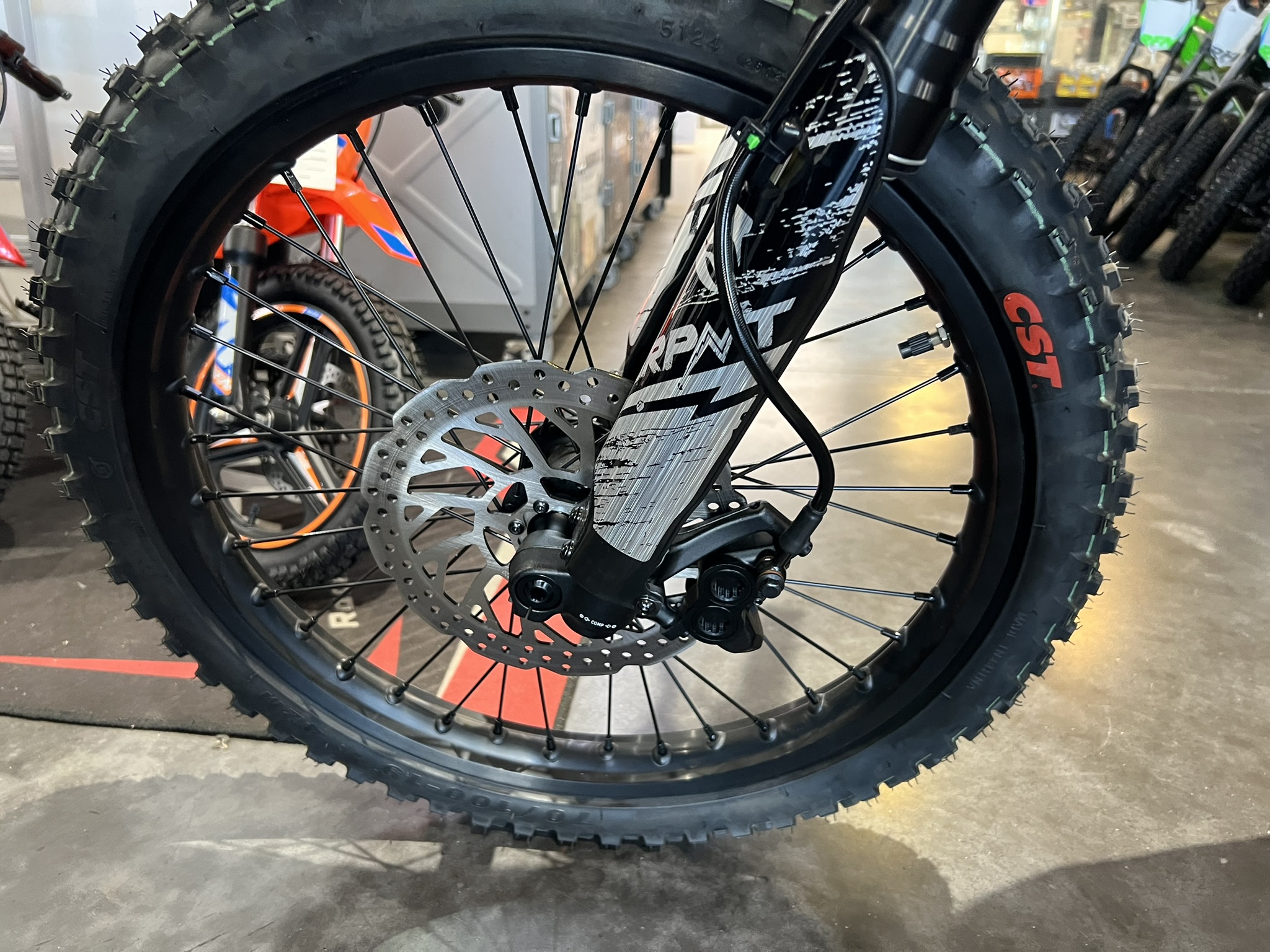 Throne Srpnt midnight blue front wheel and tire