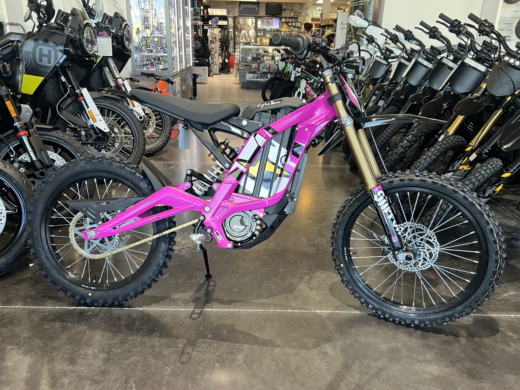 2025 Surron lbx neon pink side profile