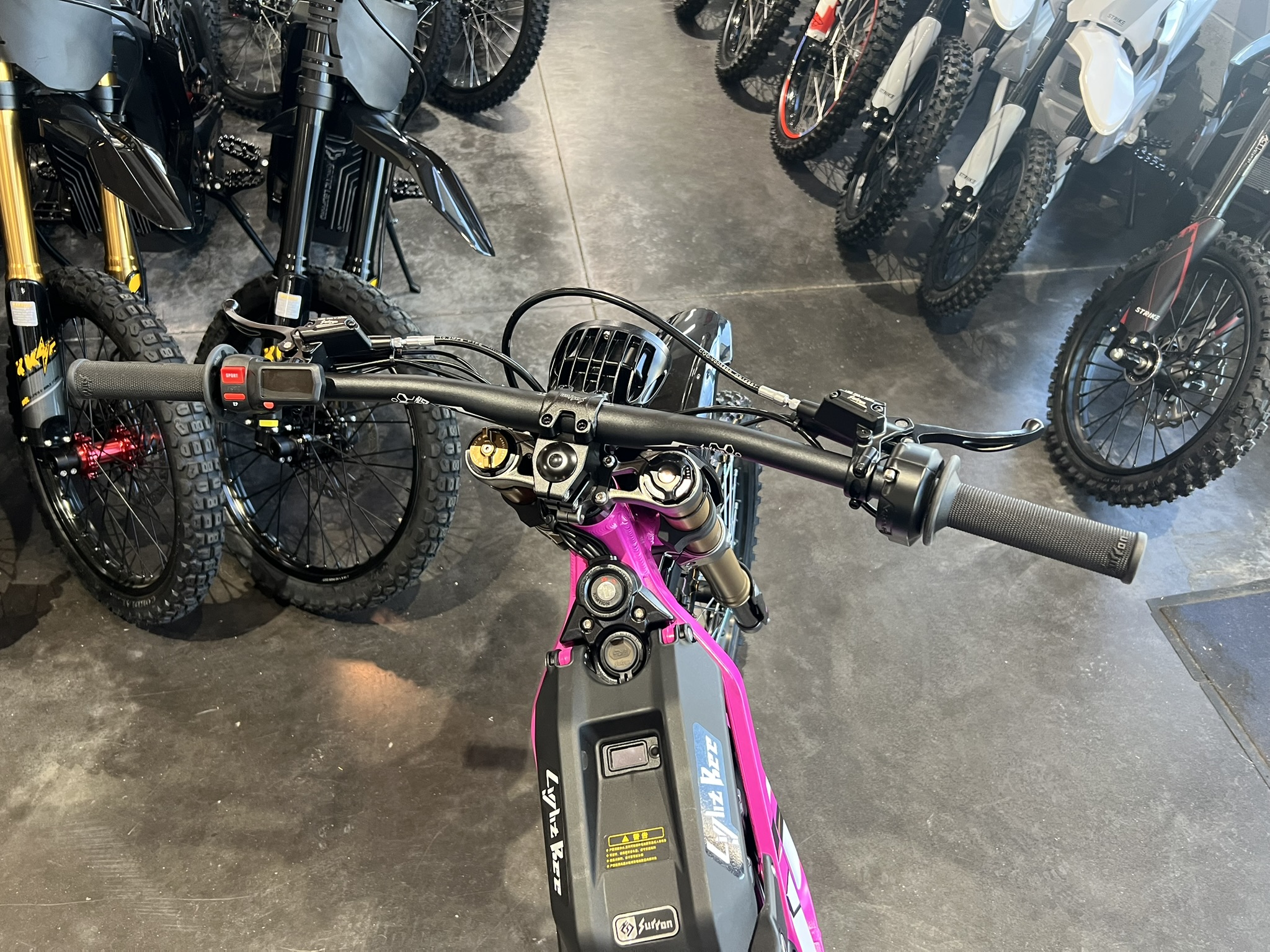 2025 Surron lbx neon pink handlebars