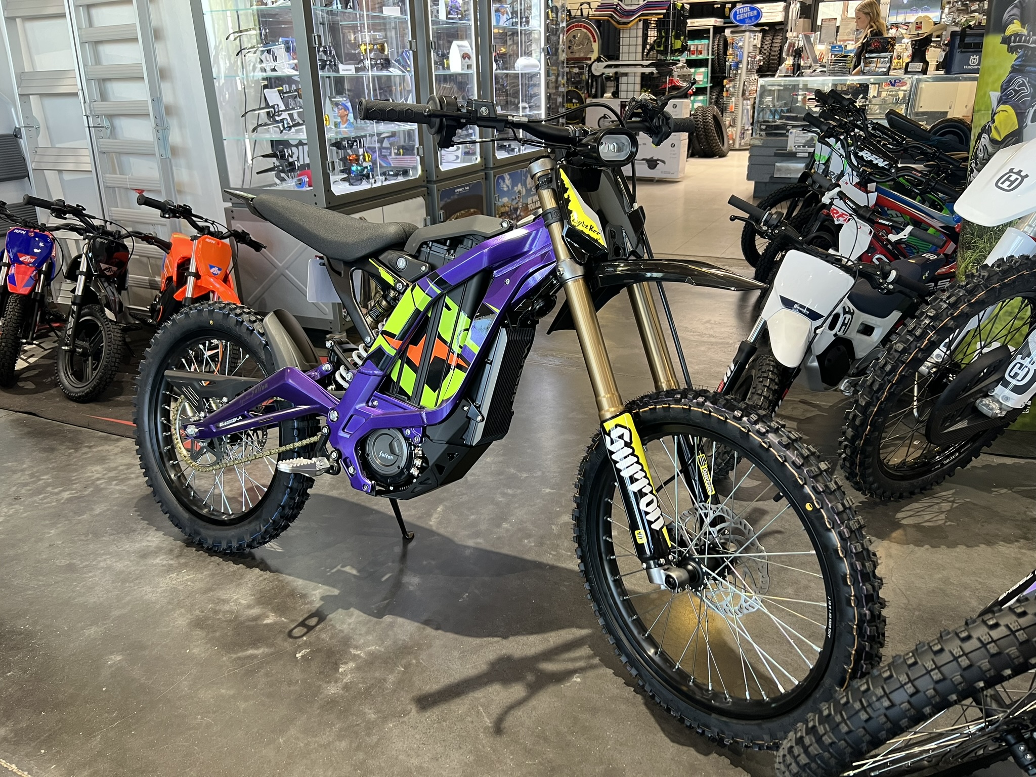 25 surron lbx purple front side profile