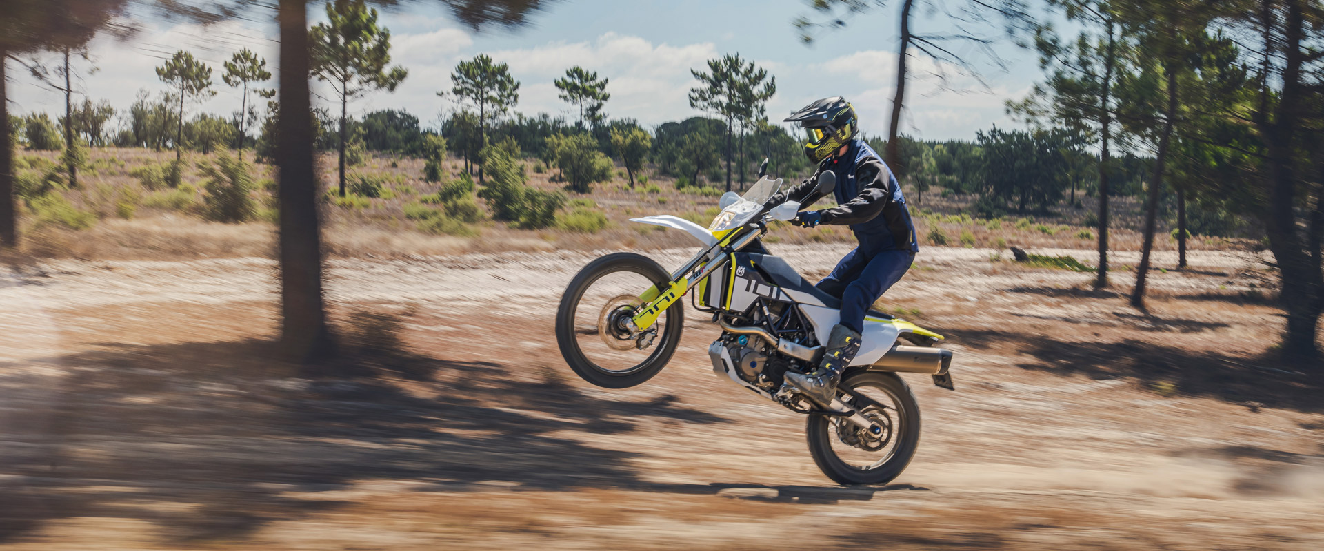2024 Husqvarana Norden 701 Enduro wheelie action photo