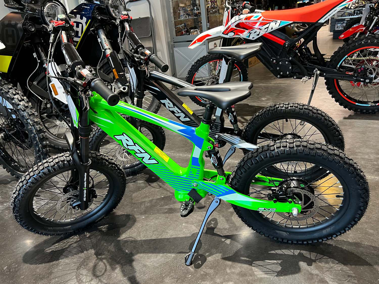 Green and Black RFN EVO Electric Bikes with 18 Inch Wheels